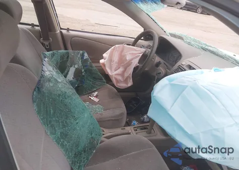 1998 Toyota Corolla Ce z USA, uszkodzony, nr VIN 2T1BR12E5WC037931